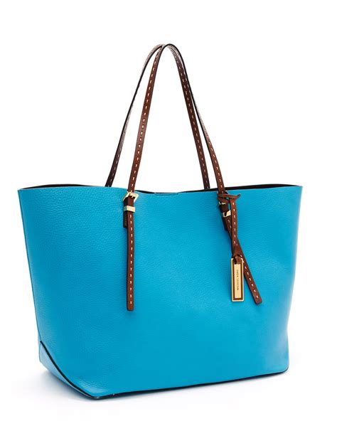 michael kors turquoise 3.4|turquoise Michael Kors purse.